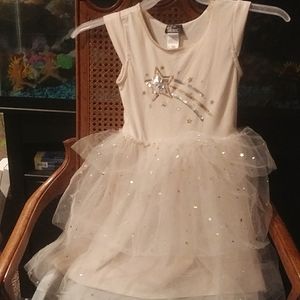 Cute short sleeve dress Peach and color little silver and gold stars.(used)